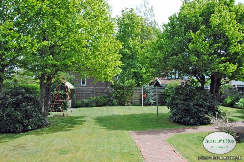 Langeoog Ferienhaus Achter&#39;t Hus - Der Garten (gemeinschaftlich)