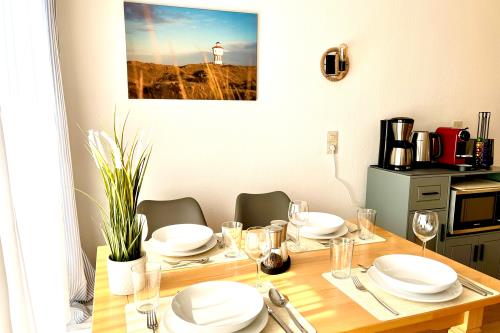 Langeoog Ferienwohnung Us Langeoog - An den Hellerwiesen - An den Hellerwiesen Essecke mit Küche