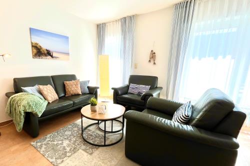 Langeoog Ferienwohnung Us Langeoog - An den Hellerwiesen - An den Hellerwiesen Wohnzimmer Couchecke