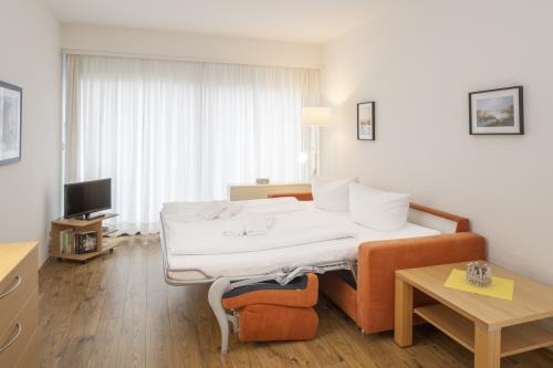 Langeoog Ferienwohnung Appartement Charlotte - Wohn/Schlafzimmer