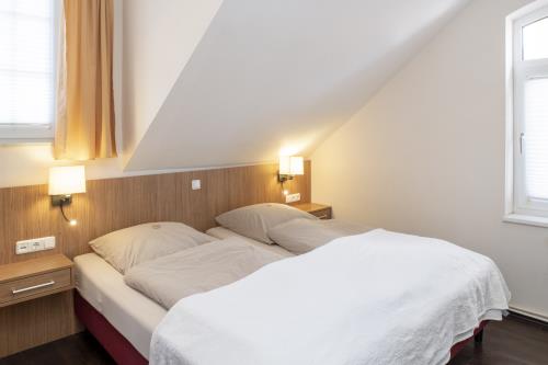 Langeoog Ferienwohnung Appartementhaus Alte Post - 25 - App 25 Schlafzimmer 1