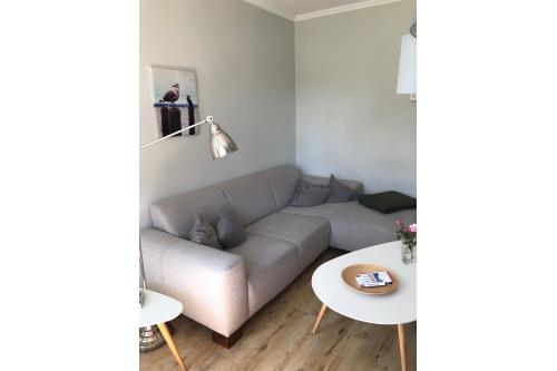 Langeoog Ferienwohnung De Fischer un sien Froo - Blumental - Wohnzimmer Sofaecke