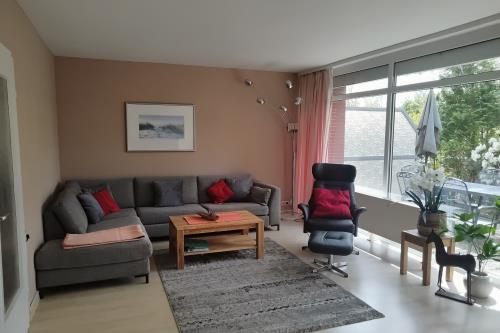 Langeoog Ferienhaus Baldes - Wohnzimmer mit Sofa