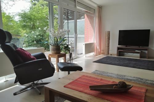 Langeoog Ferienhaus Baldes - Ruhesessel mit Fernseher