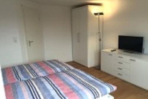 Langeoog Ferienhaus MeerZeit - MeerZeit - Schlafzimmer (1 von 3)