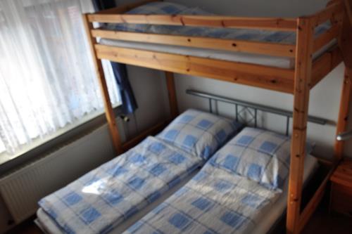 Langeoog Ferienhaus Zur freien Aussicht - 4 Maam FH - Schlafzimmer Ferienhaus &quot;Maam&quot;