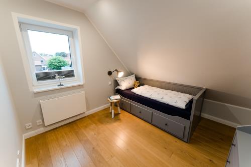 Langeoog Ferienwohnung Ferienhus Sjuts H14a - Kinderzimmer 1 im Obergeschoss