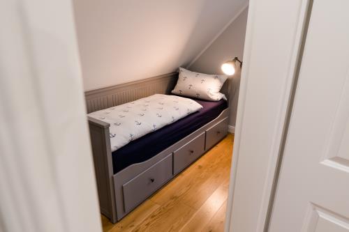Langeoog Ferienwohnung Ferienhus Sjuts H14a - Kinderzimmer 2 im Obergeschoss