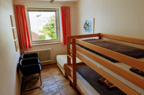 Langeoog Us Langeoog - Ferienwohnung Hasselbach - 12102023 Kinderzimmer