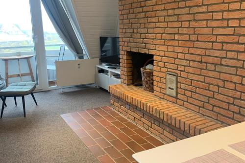 Langeoog Ferienwohnung Oog Blick - App.8 - Wohnzimmer Bild 1