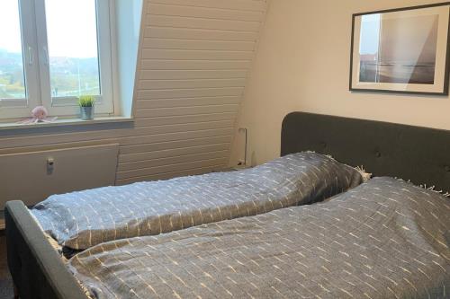 Langeoog Ferienwohnung Oog Blick - App.8 - Schlafzimmer Bild 1