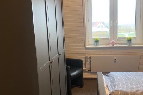 Langeoog Ferienwohnung Oog Blick - App.8 - Schlafzimmer Bild 2