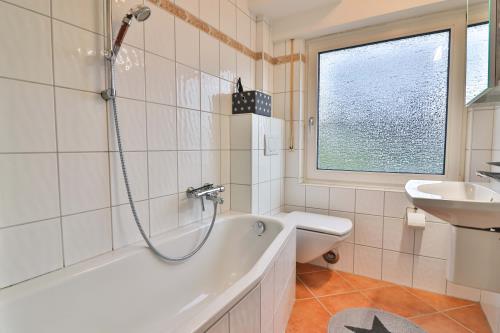 Langeoog Vermietung am Meer – Ferienwohnung Salini - Bad