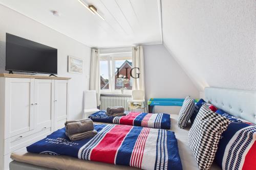 Langeoog Ferienwohnung Ferienhaus Bludau - Wohnung Dorfkoje - CAM04236G0 PR0055 STILL005