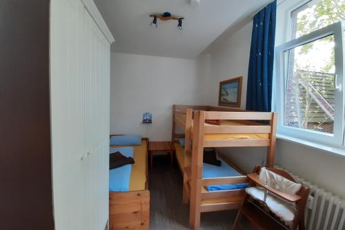 Langeoog Ferienwohnung Schaumburg - Kinderzimmer / Etagenbett