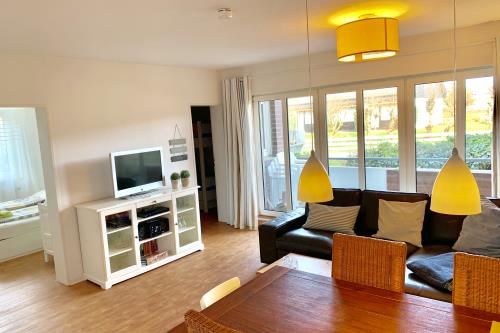 Langeoog Ferienwohnungen Fritz-Reuter-Straße - Parterre - Wohnzimmer