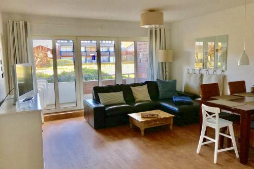 Langeoog Ferienwohnungen Fritz-Reuter-Straße - Parterre - Wohnzimmer