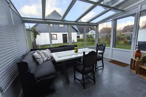 Langeoog Ferienwohnung Haus Dinkla - Wohnung unten - Wintergarten mit TV