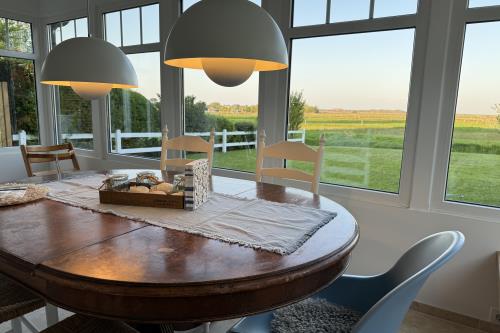 Langeoog Ferienwohnung Polderhus - 1 - Essplatz mit Ausblick