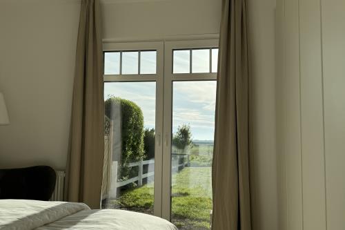 Langeoog Ferienwohnung Polderhus - 1 - Schlafzimmer 3