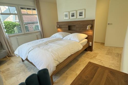 Langeoog Ferienwohnung Polderhus - 1 - Schlafzimmer 1