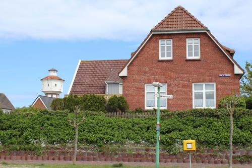 Langeoog Ferienwohnung Vermietung am Meer – Haus Killewipps - Außenansicht
