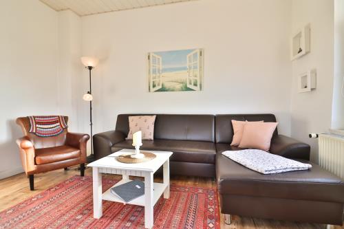 Langeoog Ferienwohnung Vermietung am Meer – Haus Killewipps - Killewipps EG - Wohnzimmer