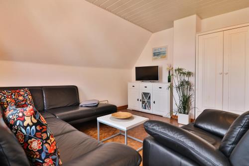 Langeoog Ferienwohnung Vermietung am Meer – Haus Killewipps - Killewipps OG - Wohnzimmer