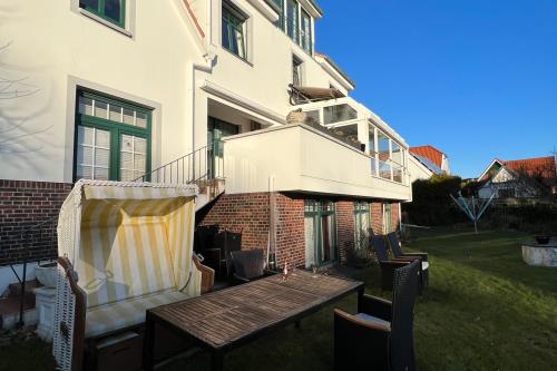 Langeoog Ferienwohnung Haus Apollonia - Sitzgelegenheiten im Garten