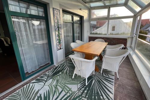 Langeoog Ferienwohnung Haus Apollonia - Wohnung 8 - W 8 offener Wintergarten