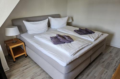 Langeoog Ferienwohnung Haus Bergschlößchen - 4 - Schlafzimmer