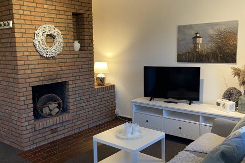 Langeoog Ferienwohnung Haus Bettina und Volker Schmidt - App.6 - Kamin