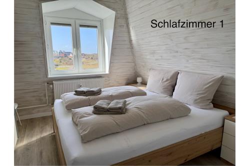 Langeoog Ferienwohnung Haus Bettina und Volker Schmidt - App.7 - Schlafzimmer 1
