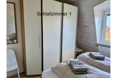 Langeoog Ferienwohnung Haus Bettina und Volker Schmidt - App.7 - Schlafzimmer 1