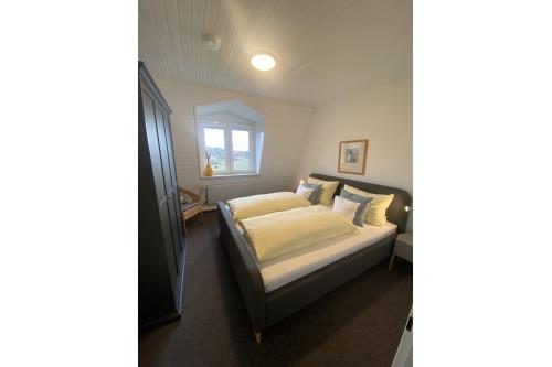 Langeoog Ferienwohnung Haus Bettina und Volker Schmidt - App.8 - Schlafzimmer 1 APP 8