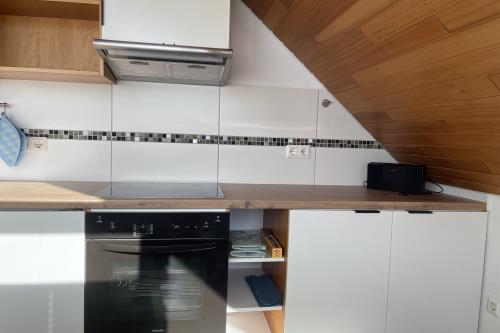 Langeoog Ferienwohnung Haus Dünenrose-Sanddornweg - Dünenrose3 - Küche 