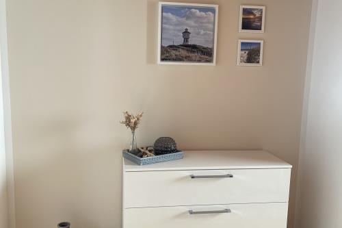 Langeoog Ferienwohnung Haus Dünenrose-Sanddornweg - Dünenrose3 - Wohnzimmer 