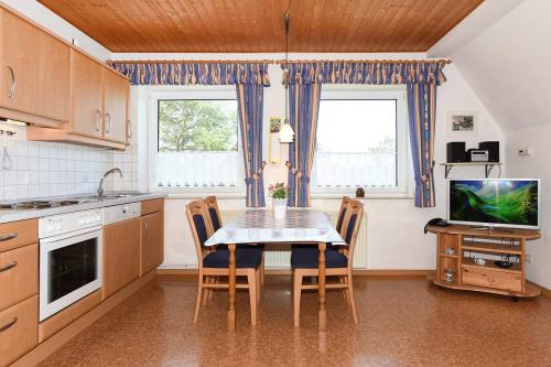 Langeoog Ferienwohnung Haus Strandboje und Haus Dünenrose - Dünenblick - Wohnzimmer mit Küchenbereich
