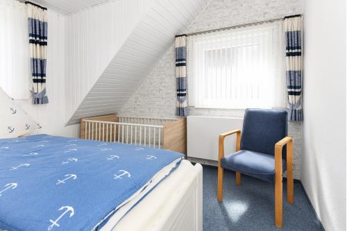 Langeoog Ferienwohnung Haus Strandboje und Haus Dünenrose - Dünenperle - Schlafzimmer 1