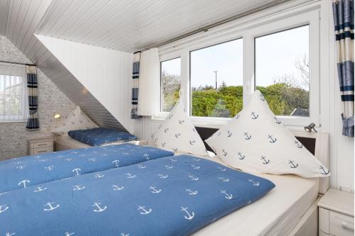 Langeoog Ferienwohnung Haus Strandboje und Haus Dünenrose - Dünenperle - Schlafzimmer 1
