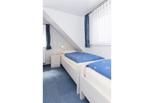 Langeoog Ferienwohnung Haus Strandboje und Haus Dünenrose - Dünenperle - Schlafzimmer 2