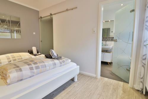 Langeoog Vermietung am Meer – Kiek rin bi Kati - Ferienwohnung 1 - Schlafzimmer