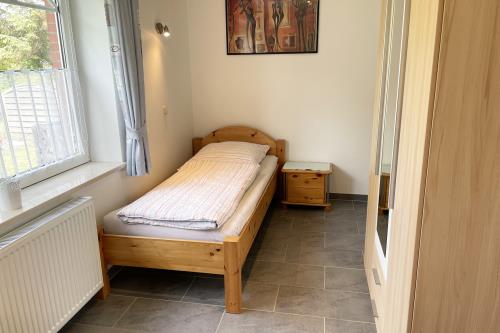 Langeoog Ferienwohnung Haus Krasniqi - 3 - Schlafzimmer 2