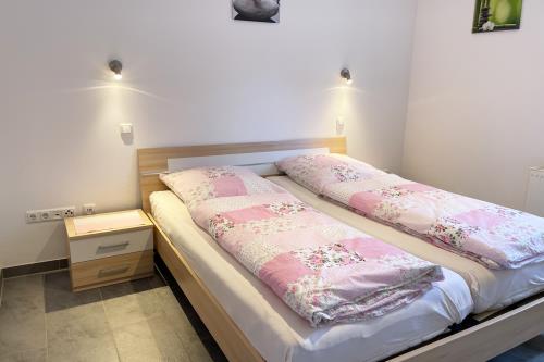 Langeoog Ferienwohnung Haus Krasniqi - 3 - Schlafzimmer 1