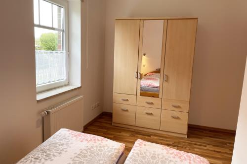 Langeoog Ferienwohnung Haus Krasniqi II - FW 1 - Schlaffzimmer 1