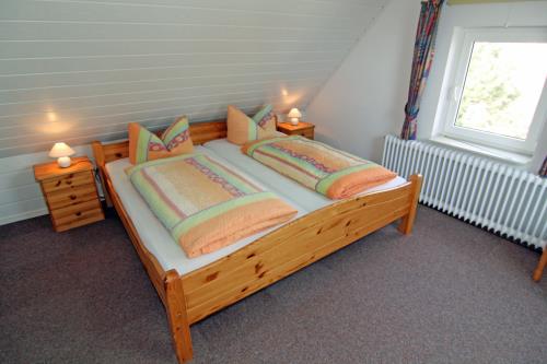 Langeoog Ferienwohnung Haus Numrich - Whg. 4 - Schlafzimmer Doppelbett