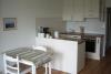 Langeoog Ferienwohnung Haus Rasmus, Appartement 6 - Küchenzeile mit Anrichte und Esstisch