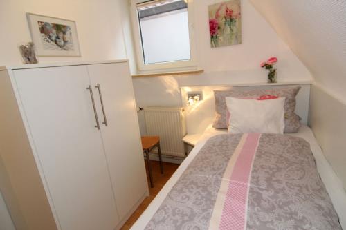 Langeoog Ferienwohnung Haus Seeschwalbe - 4 - Schlafzimmer