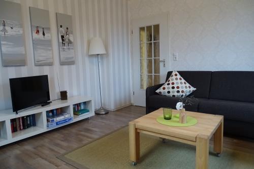 Langeoog Ferienwohnung Haus Strandnah - EG - EG Wohnzimmer mit Schlafsofa