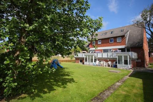 Langeoog Ferienwohnung Haus Windjammer - Gartenansicht des Hauses
